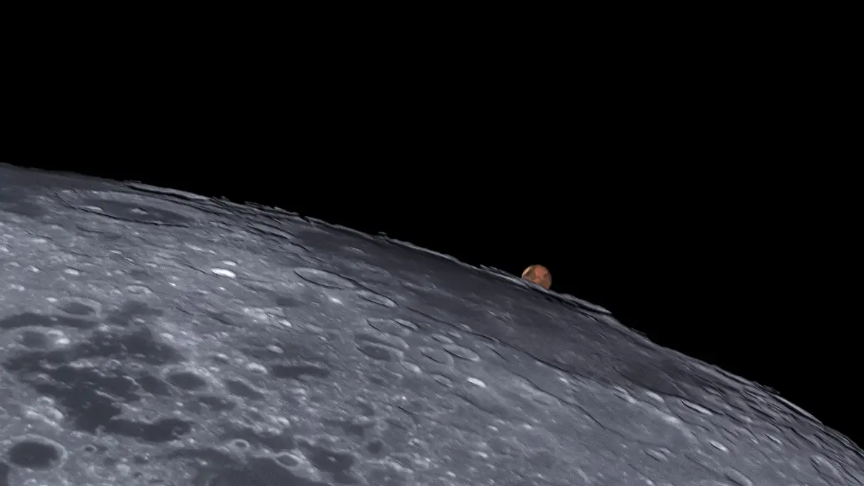 Mars rising from behind the Moon during a unique astronomical event.